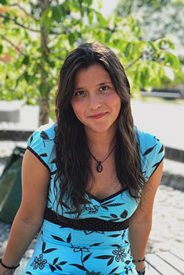 A portrait of Catalina Rodriguez Näsman with a blue dress